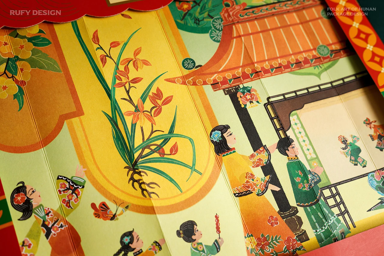 湖南民艺礼盒内部插画中人物、花卉和建筑图案近景